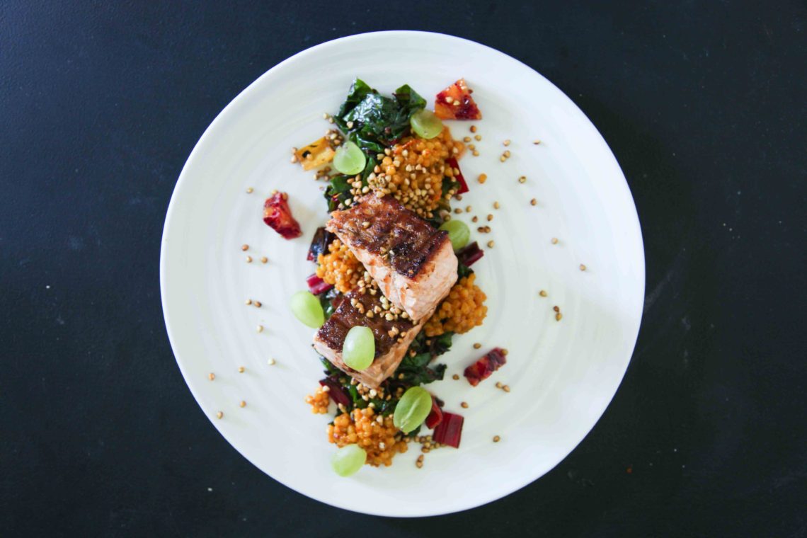 Berries and Spice | Crispy Salmon with Ruby Chard, Giant Couscous and Grapes
