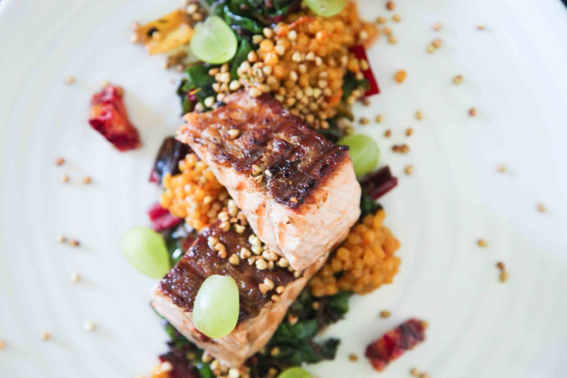 Berries and Spice | Crispy Salmon with Ruby Chard, Giant Couscous and Grapes 
