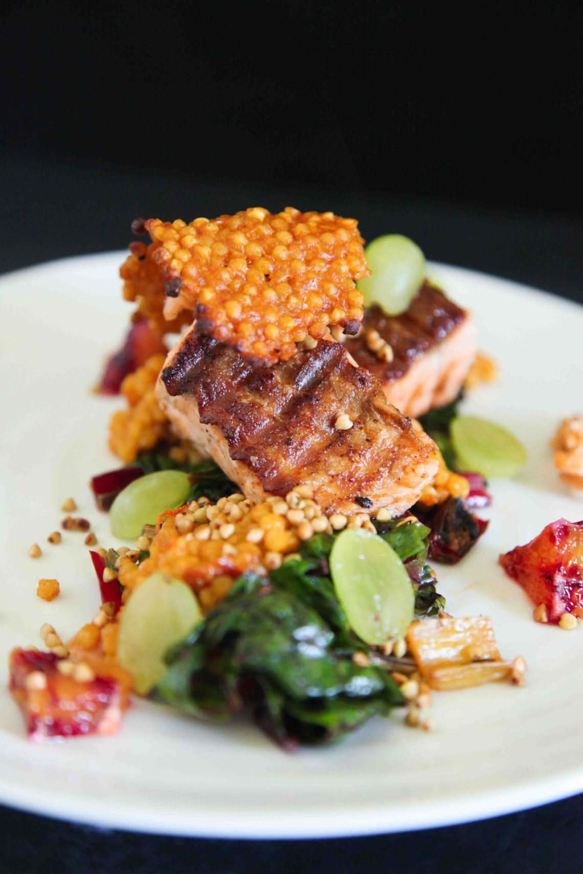 Berries and Spice | Crispy Salmon with Ruby Chard, Giant Couscous and Grapes