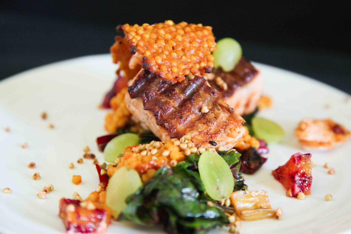 Berries and Spice | Crispy Salmon with Ruby Chard, Giant Couscous and Grapes