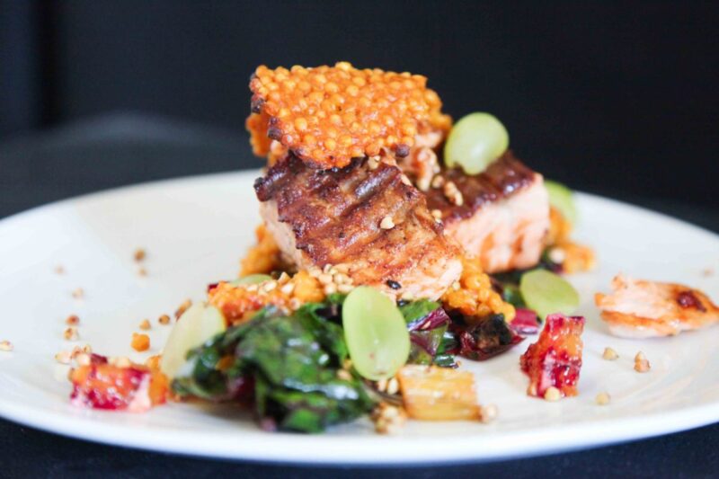 Berries and Spice | Crispy Salmon with Ruby Chard, Giant Couscous and Grapes