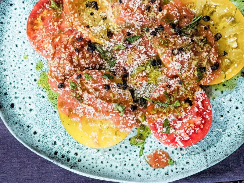 tomato carpaccio with lacto fermented tomato and spruce tip salsa - berries and spice